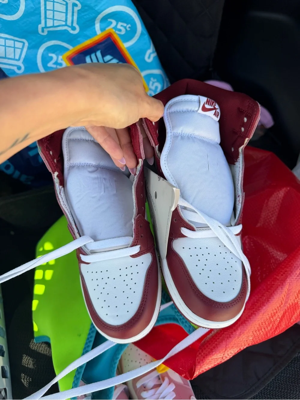 Jordan Women’s High-Top Sneaker in White and Burgundy